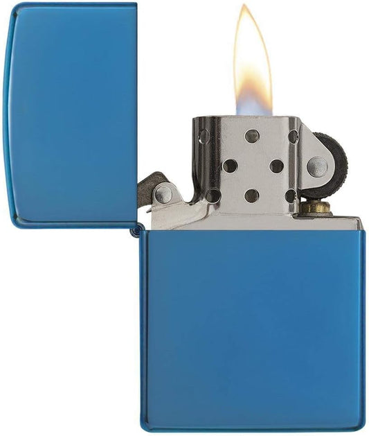 Blue Zippo lighter with flame on a white background