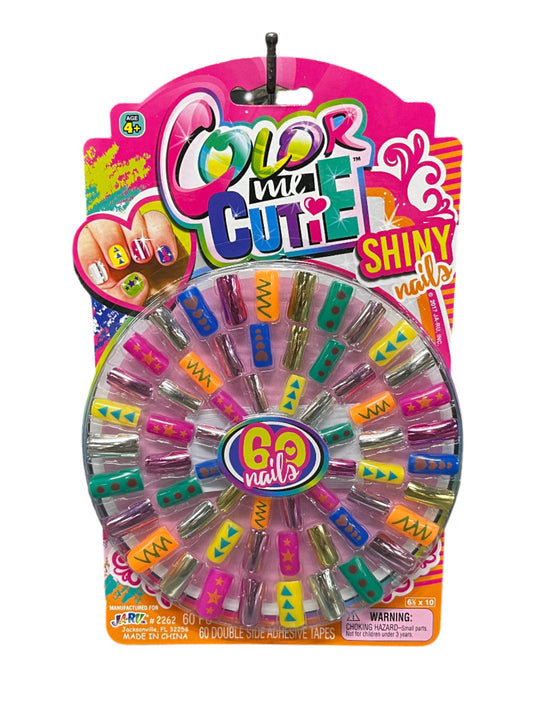 Packaged toy with colorful nails and 'Color Me Cutie' 