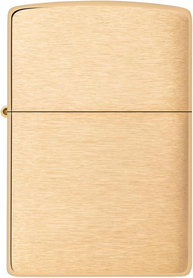 Gold lighter with a brushed finish on a white background
